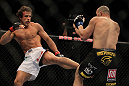 LAS VEGAS, NV - MAY 26:  Kyle Kingsbury (left) kicks Glover Teixeira during a light heavyweight bout at UFC 146 at MGM Grand Garden Arena on May 26, 2012 in Las Vegas, Nevada.  (Photo by Josh Hedges/Zuffa LLC/Zuffa LLC via Getty Images)