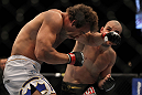 LAS VEGAS, NV - MAY 26:  Glover Teixeira (right) punches Kyle Kingsbury during a light heavyweight bout at UFC 146 at MGM Grand Garden Arena on May 26, 2012 in Las Vegas, Nevada.  (Photo by Josh Hedges/Zuffa LLC/Zuffa LLC via Getty Images)