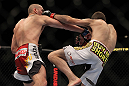 LAS VEGAS, NV - MAY 26:  (L-R) Paul Sass punches Jacob Volkmann during a lightweight bout at UFC 146 at MGM Grand Garden Arena on May 26, 2012 in Las Vegas, Nevada.  (Photo by Josh Hedges/Zuffa LLC/Zuffa LLC via Getty Images)