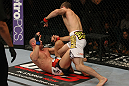 LAS VEGAS, NV - MAY 26:  Jacob Volkmann (white shorts) leans in to punch Paul Sass during a lightweight bout at UFC 146 at MGM Grand Garden Arena on May 26, 2012 in Las Vegas, Nevada.  (Photo by Donald Miralle/Zuffa LLC/Zuffa LLC via Getty Images)