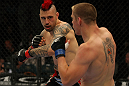 LAS VEGAS, NV - MAY 26:  Dan Hardy (L) throws a punch at Duane Ludwig during a welterweight bout at UFC 146 at MGM Grand Garden Arena on May 26, 2012 in Las Vegas, Nevada.  (Photo by Donald Miralle/Zuffa LLC/Zuffa LLC via Getty Images)