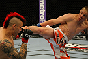 LAS VEGAS, NV - MAY 26:  Duane Ludwig (right) kicks Dan Hardy during a welterweight bout at UFC 146 at MGM Grand Garden Arena on May 26, 2012 in Las Vegas, Nevada.  (Photo by Donald Miralle/Zuffa LLC/Zuffa LLC via Getty Images)