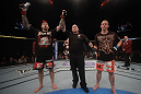 LAS VEGAS, NV - MAY 26:  Dan Hardy (L) reacts to his knockout victory over Duane Ludwig during a welterweight bout at UFC 146 at MGM Grand Garden Arena on May 26, 2012 in Las Vegas, Nevada.  (Photo by Donald Miralle/Zuffa LLC/Zuffa LLC via Getty Images)