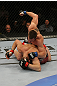 LAS VEGAS, NV - MAY 26:  CB Dollaway (top) punches Jason Miller during a middleweight bout at UFC 146 at MGM Grand Garden Arena on May 26, 2012 in Las Vegas, Nevada.  (Photo by Donald Miralle/Zuffa LLC/Zuffa LLC via Getty Images)