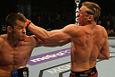 LAS VEGAS, NV - MAY 26:  CB Dollaway (L) punches Jason Miller during a middleweight bout at UFC 146 at MGM Grand Garden Arena on May 26, 2012 in Las Vegas, Nevada.  (Photo by Donald Miralle/Zuffa LLC/Zuffa LLC via Getty Images)