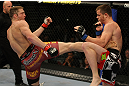 LAS VEGAS, NV - MAY 26:  Jason Miller (L) kicks CB Dollaway during a middleweight bout at UFC 146 at MGM Grand Garden Arena on May 26, 2012 in Las Vegas, Nevada.  (Photo by Donald Miralle/Zuffa LLC/Zuffa LLC via Getty Images)