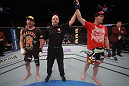 LAS VEGAS, NV - MAY 26:  CB Dollaway (R) is declared the winner against Jason Miller (L) during a middleweight bout at UFC 146 at MGM Grand Garden Arena on May 26, 2012 in Las Vegas, Nevada.  (Photo by Donald Miralle/Zuffa LLC/Zuffa LLC via Getty Images)