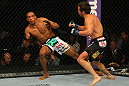 LAS VEGAS, NV - MAY 26:  Jamie Varner (R) pursues Edson Barboza after a punch during a lightweight bout at UFC 146 at MGM Grand Garden Arena on May 26, 2012 in Las Vegas, Nevada.  (Photo by Donald Miralle/Zuffa LLC/Zuffa LLC via Getty Images)
