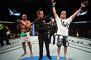 LAS VEGAS, NV - MAY 26:  Jamie Varner (R) is declared the winner in his fight against Edson Barboza (L) during a lightweight bout at UFC 146 at MGM Grand Garden Arena on May 26, 2012 in Las Vegas, Nevada.  (Photo by Donald Miralle/Zuffa LLC/Zuffa LLC via Getty Images)