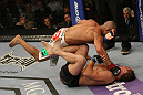 LAS VEGAS, NV - MAY 26:  Diego Brandao (top) punches Darren Elkins during a featherweight bout at UFC 146 at MGM Grand Garden Arena on May 26, 2012 in Las Vegas, Nevada.  (Photo by Donald Miralle/Zuffa LLC/Zuffa LLC via Getty Images)