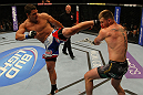 LAS VEGAS, NV - MAY 26:  Shane Del Rosario (L) kicks Stipe Miocic during a heavyweight bout at UFC 146 at MGM Grand Garden Arena on May 26, 2012 in Las Vegas, Nevada.  (Photo by Donald Miralle/Zuffa LLC/Zuffa LLC via Getty Images)
