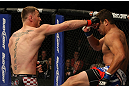LAS VEGAS, NV - MAY 26:  Stipe Miocic (L) punches Shane Del Rosario during a heavyweight bout at UFC 146 at MGM Grand Garden Arena on May 26, 2012 in Las Vegas, Nevada.  (Photo by Donald Miralle/Zuffa LLC/Zuffa LLC via Getty Images)