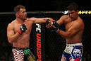 LAS VEGAS, NV - MAY 26:  Stipe Miocic (L) punches Shane Del Rosario during a heavyweight bout at UFC 146 at MGM Grand Garden Arena on May 26, 2012 in Las Vegas, Nevada.  (Photo by Donald Miralle/Zuffa LLC/Zuffa LLC via Getty Images)