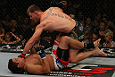 LAS VEGAS, NV - MAY 26:  Stipe Miocic (top) punches Shane Del Rosario during a heavyweight bout at UFC 146 at MGM Grand Garden Arena on May 26, 2012 in Las Vegas, Nevada.  (Photo by Donald Miralle/Zuffa LLC/Zuffa LLC via Getty Images)