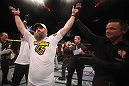 LAS VEGAS, NV - MAY 26:  Referee Steve Mazzagatti (R) raises Roy Nelson's (L) hand after his knockout victory over Dave Herman during a heavyweight bout at UFC 146 at MGM Grand Garden Arena on May 26, 2012 in Las Vegas, Nevada.  (Photo by Donald Miralle/Zuffa LLC/Zuffa LLC via Getty Images)