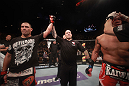 LAS VEGAS, NV - MAY 26:  Cain Velasquez (L) has his hand raised after defeating Antonio Silva (R) during a heavyweight bout at UFC 146 at MGM Grand Garden Arena on May 26, 2012 in Las Vegas, Nevada.  (Photo by Donald Miralle/Zuffa LLC/Zuffa LLC via Getty Images)