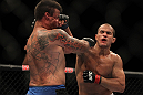 LAS VEGAS, NV - MAY 26:  (R-L) Junior dos Santos punches Frank Mir during the Heavyweight Championship bout at UFC 146 at MGM Grand Garden Arena on May 26, 2012 in Las Vegas, Nevada.  (Photo by Josh Hedges/Zuffa LLC/Zuffa LLC via Getty Images)
