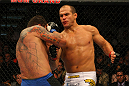 LAS VEGAS, NV - MAY 26:  Junior dos Santos (R) punches Frank Mir during the Heavyweight Championship bout at UFC 146 at MGM Grand Garden Arena on May 26, 2012 in Las Vegas, Nevada. (Photo by Donald Miralle/Zuffa LLC/Zuffa LLC via Getty Images)