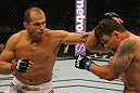 LAS VEGAS, NV - MAY 26:  Junior dos Santos (L) punches Frank Mir during the Heavyweight Championship bout at UFC 146 at MGM Grand Garden Arena on May 26, 2012 in Las Vegas, Nevada. (Photo by Donald Miralle/Zuffa LLC/Zuffa LLC via Getty Images)