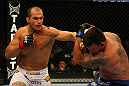 LAS VEGAS, NV - MAY 26:  Junior dos Santos (L) punches Frank Mir during the Heavyweight Championship bout at UFC 146 at MGM Grand Garden Arena on May 26, 2012 in Las Vegas, Nevada. (Photo by Donald Miralle/Zuffa LLC/Zuffa LLC via Getty Images)