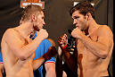 LAS VEGAS, NV - MAY 31:   (L-R) Opponents Justin Lawrence and John Cofer face off after making weight during The Ultimate Fighter Live weigh in at the Palms Casino Resort on May 31, 2012 in Las Vegas, Nevada.  (Photo by Josh Hedges/Zuffa LLC/Zuffa LLC via Getty Images)  *** Local Caption *** Justin Lawrence; John Cofer