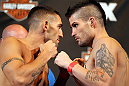 LAS VEGAS, NV - MAY 31:   (L-R) Opponents Joe Proctor and Jeremy Larsen face off after making weight during The Ultimate Fighter Live weigh in at the Palms Casino Resort on May 31, 2012 in Las Vegas, Nevada.  (Photo by Josh Hedges/Zuffa LLC/Zuffa LLC via Getty Images)  *** Local Caption *** Joe Proctor; Jeremy Larsen