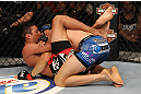 LAS VEGAS, NV - JUNE 01:   Charles Oliveira (left) attempts to submit Jonathan Brookins in a Featherweight bout during The Ultimate Fighter Live Finale at the Pearl Theater at the Palms Casino Resort on June 1, 2012 in Las Vegas, Nevada.  (Photo by Josh Hedges/Zuffa LLC/Zuffa LLC via Getty Images)  *** Local Caption *** Jonathan Brookins; Charles Oliveira