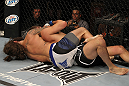 LAS VEGAS, NV - JUNE 01:   (L-R) Michael Chiesa attempts to submit Al Iaquinta in a Lightweight bout during The Ultimate Fighter Live Finale at the Pearl Theater at the Palms Casino Resort on June 1, 2012 in Las Vegas, Nevada.  (Photo by Josh Hedges/Zuffa LLC/Zuffa LLC via Getty Images)  *** Local Caption *** Al Iaquinta; Michael Chiesa