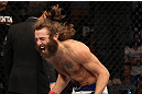 LAS VEGAS, NV - JUNE 01:   Michael Chiesa reacts to his submission victory in a Lightweight bout against Al Iaquinta during The Ultimate Fighter Live Finale at the Pearl Theater at the Palms Casino Resort on June 1, 2012 in Las Vegas, Nevada.  (Photo by Josh Hedges/Zuffa LLC/Zuffa LLC via Getty Images)  *** Local Caption *** Michael Chiesa