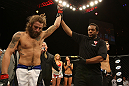 LAS VEGAS, NV - JUNE 01:   Michael Chiesa (left) reacts to being declared the winner over Al Iaquinta (right) during The Ultimate Fighter Live Finale at the Pearl Theater at the Palms Casino Resort on June 1, 2012 in Las Vegas, Nevada.  (Photo by Josh Hedges/Zuffa LLC/Zuffa LLC via Getty Images)  *** Local Caption *** Al Iaquinta; Michael Chiesa