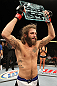 LAS VEGAS, NV - JUNE 01:   Michael Chiesa holding the Ultimate Fighter trophy during The Ultimate Fighter Live Finale at the Pearl Theater at the Palms Casino Resort on June 1, 2012 in Las Vegas, Nevada.  (Photo by Josh Hedges/Zuffa LLC/Zuffa LLC via Getty Images)  *** Local Caption *** Michael Chiesa