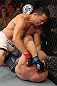 LAS VEGAS, NV - JUNE 01:   Jake Ellenberger (top) punches Martin Kampmann in a Welterweight bout during The Ultimate Fighter Live Finale at the Pearl Theater at the Palms Casino Resort on June 1, 2012 in Las Vegas, Nevada.  (Photo by Josh Hedges/Zuffa LLC/Zuffa LLC via Getty Images)  *** Local Caption *** Jake Ellenberger; Martin Kampmann
