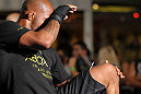 SUNRISE, FL - JUNE 06:   Demetrious Johnson works out for fans and media during the UFC open workouts at Sawgrass Mills Mall on June 6, 2012 in Sunrise, Florida.  (Photo by Josh Hedges/Zuffa LLC/Zuffa LLC via Getty Images)
