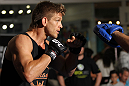 SUNRISE, FL - JUNE 06:   Mike Pyle works out for the fans and media during the UFC open workouts at Sawgrass Mills Mall on June 6, 2012 in Sunrise, Florida.  (Photo by Josh Hedges/Zuffa LLC/Zuffa LLC via Getty Images)