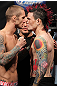 SUNRISE, FL - JUNE 07:   (L-R) Bantamweight opponents Eddie Wineland and Scott Jorgensen face off after making weight during the UFC on FX 3 official weigh in at Bank Atlantic Center on June 7, 2012 in Sunrise, Florida.  (Photo by Josh Hedges/Zuffa LLC/Zuffa LLC via Getty Images)
