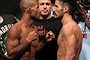 SUNRISE, FL - JUNE 07:   (L-R) Featherweight opponents Demetrious Johnson and Ian McCall face off after making weight during the UFC on FX 3 official weigh in at Bank Atlantic Center on June 7, 2012 in Sunrise, Florida.  (Photo by Josh Hedges/Zuffa LLC/Zuffa LLC via Getty Images)