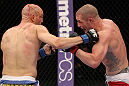 SUNRISE, FL - JUNE 08:   (L-R) Sean Pierson punches Jake Hecht in Welterweight bout during the UFC on FX 3 event at Bank Atlantic Center on June 8, 2012 in Sunrise, Florida.  (Photo by Josh Hedges/Zuffa LLC/Zuffa LLC via Getty Images)