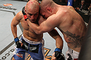 SUNRISE, FL - JUNE 08:   (L-R) Sean Pierson punches Jake Hecht in Welterweight bout during the UFC on FX 3 event at Bank Atlantic Center on June 8, 2012 in Sunrise, Florida.  (Photo by Josh Hedges/Zuffa LLC/Zuffa LLC via Getty Images)