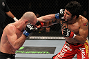 SUNRISE, FL - JUNE 08:   (R-L) Henry Martinez and Bernardo Magalhaes trade punches in Lightweight bout during the UFC on FX 3 event at Bank Atlantic Center on June 8, 2012 in Sunrise, Florida.  (Photo by Josh Hedges/Zuffa LLC/Zuffa LLC via Getty Images)