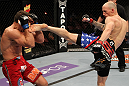 SUNRISE, FL - JUNE 08:   (R-L) Buddy Roberts kicks Caio Magalhaes in Middleweight bout during the UFC on FX 3 event at Bank Atlantic Center on June 8, 2012 in Sunrise, Florida.  (Photo by Josh Hedges/Zuffa LLC/Zuffa LLC via Getty Images)
