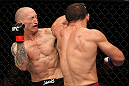 SUNRISE, FL - JUNE 08:   (R-L) Caio Magalhaes punches Buddy Roberts in Middleweight bout during the UFC on FX 3 event at Bank Atlantic Center on June 8, 2012 in Sunrise, Florida.  (Photo by Josh Hedges/Zuffa LLC/Zuffa LLC via Getty Images)