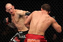 SUNRISE, FL - JUNE 08:   (L-R) Buddy Roberts punches Caio Magalhaes in Middleweight bout during the UFC on FX 3 event at Bank Atlantic Center on June 8, 2012 in Sunrise, Florida.  (Photo by Josh Hedges/Zuffa LLC/Zuffa LLC via Getty Images)