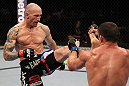 SUNRISE, FL - JUNE 08:   (L-R) Buddy Roberts kicks Caio Magalhaes in Middleweight bout during the UFC on FX 3 event at Bank Atlantic Center on June 8, 2012 in Sunrise, Florida.  (Photo by Josh Hedges/Zuffa LLC/Zuffa LLC via Getty Images)