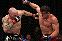 SUNRISE, FL - JUNE 08:   (R-L) Caio Magalhaes throws a punch against Buddy Roberts in Middleweight bout during the UFC on FX 3 event at Bank Atlantic Center on June 8, 2012 in Sunrise, Florida.  (Photo by Josh Hedges/Zuffa LLC/Zuffa LLC via Getty Images)