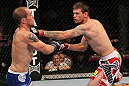 SUNRISE, FL - JUNE 08:   (R-L) Tim Means punches Justin Salas in Lightweight bout during the UFC on FX 3 event at Bank Atlantic Center on June 8, 2012 in Sunrise, Florida.  (Photo by Josh Hedges/Zuffa LLC/Zuffa LLC via Getty Images)