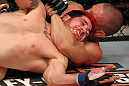 SUNRISE, FL - JUNE 08:   (R-L) Dustin Pague submits Jared Papazian with a rear choke in Bantamweight bout during the UFC on FX 3 event at Bank Atlantic Center on June 8, 2012 in Sunrise, Florida.  (Photo by Josh Hedges/Zuffa LLC/Zuffa LLC via Getty Images)