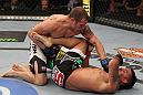 SUNRISE, FL - JUNE 08:   (L-R) Matt Grice punches Leonard Garcia in Featherweight bout during the UFC on FX 3 event at Bank Atlantic Center on June 8, 2012 in Sunrise, Florida.  (Photo by Josh Hedges/Zuffa LLC/Zuffa LLC via Getty Images)