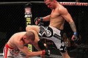 SUNRISE, FL - JUNE 08:   (R-L) Lance Benoist lands a flying knee against Seth Baczynski in a Welterweight bout during the UFC on FX 3 event at Bank Atlantic Center on June 8, 2012 in Sunrise, Florida.  (Photo by Josh Hedges/Zuffa LLC/Zuffa LLC via Getty Images)