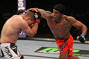 SUNRISE, FL - JUNE 08:   (R-L) Carlos Eduardo Rocha punches Mike Pierce in a Welterweight bout during the UFC on FX 3 event at Bank Atlantic Center on June 8, 2012 in Sunrise, Florida.  (Photo by Josh Hedges/Zuffa LLC/Zuffa LLC via Getty Images)