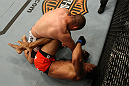 SUNRISE, FL - JUNE 08:   (L-R) Mike Pierce punches Carlos Eduardo Rocha in a Welterweight bout during the UFC on FX 3 event at Bank Atlantic Center on June 8, 2012 in Sunrise, Florida.  (Photo by Josh Hedges/Zuffa LLC/Zuffa LLC via Getty Images)